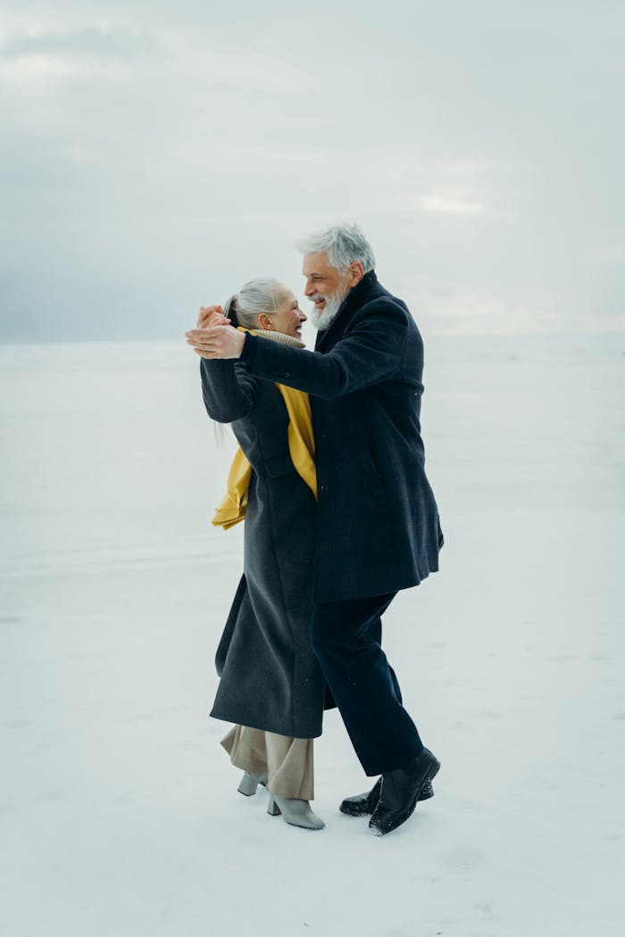 Beautiful Couple Dancing on Snow